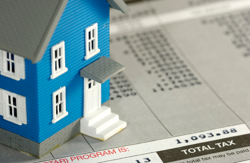 How do you find out how much you owe in taxes on your house?