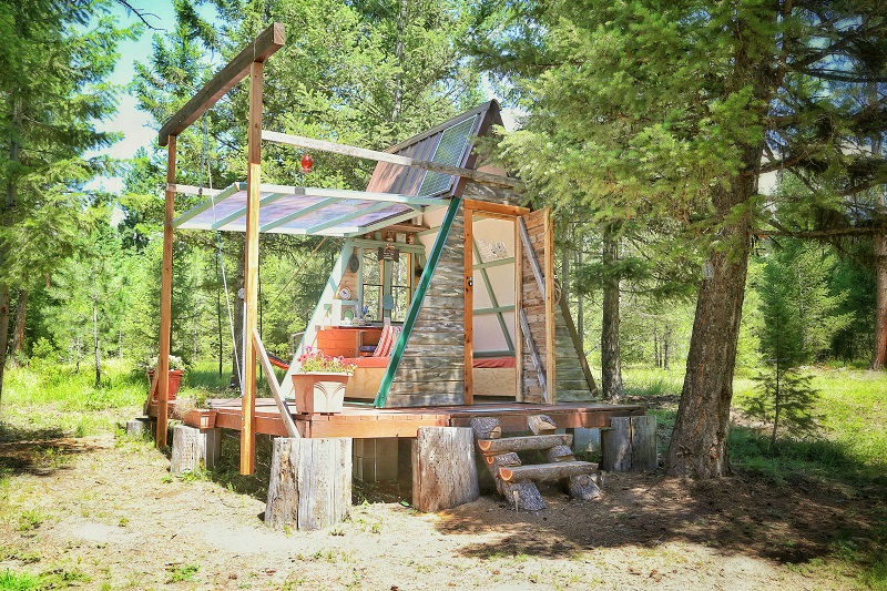 A-frame cabin with wing wall