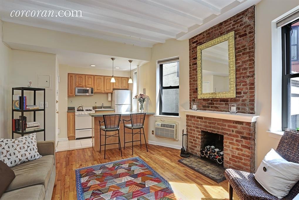 The kitchen and living room at 46 West 65th Street