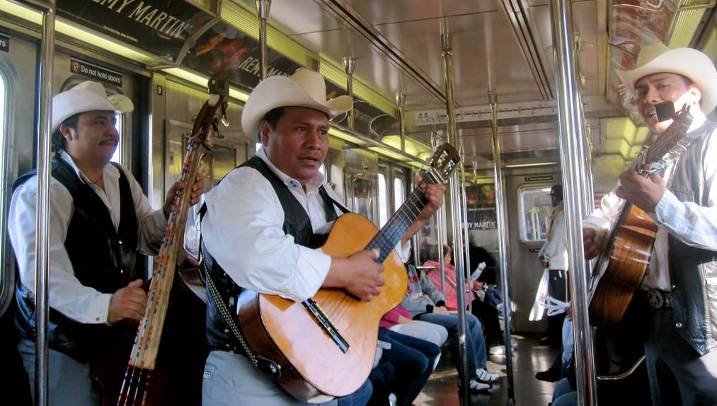 Mariachi guys on subway (Source: Chris Goldberg via Flickr Creative Commons)