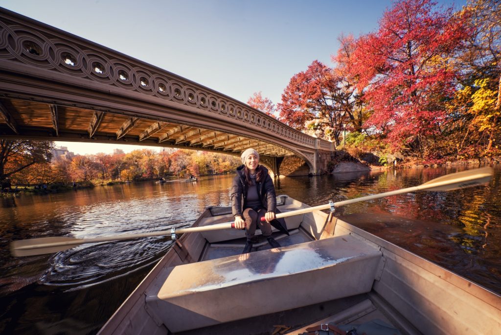 image of a woman on a rowboat in Central Park, New York City