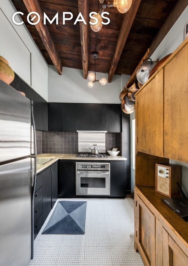 Photo of kitchen at Parker Posey's apartment